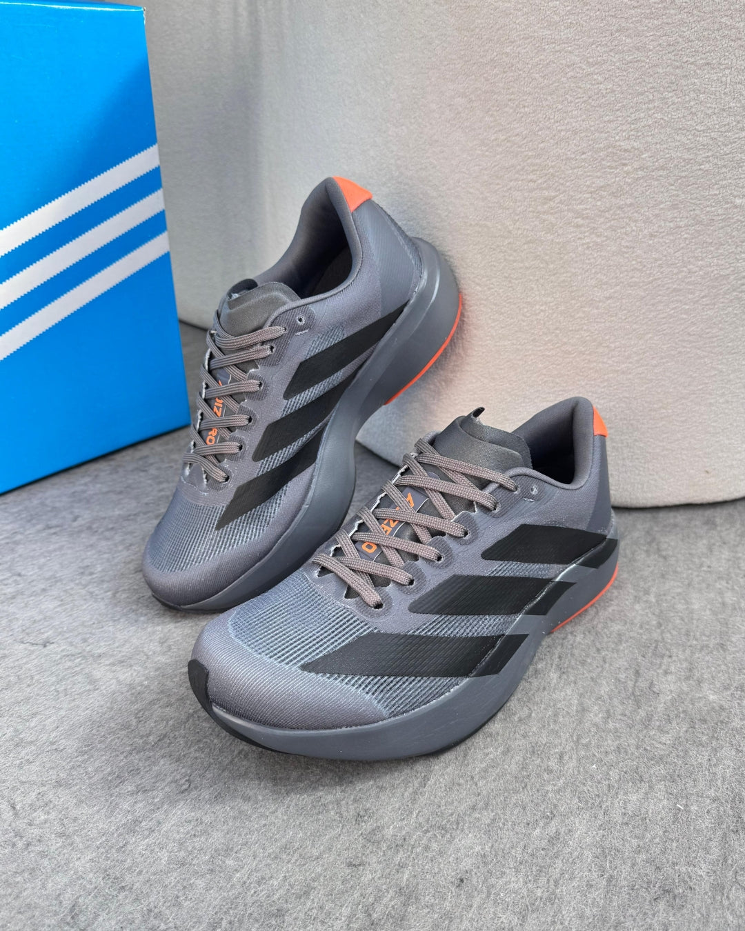 Tênis Masculino Adizero Evo SL Chumbo e Laranja